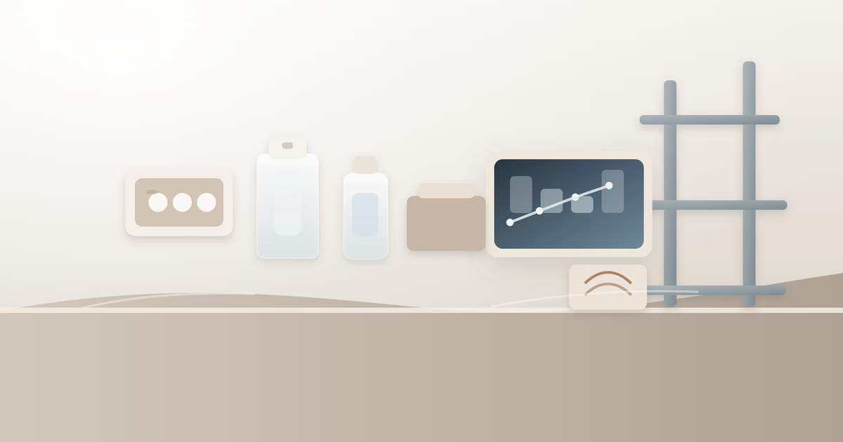 Back-office beauty retail workspace with sample trays, skincare bottles, cartons and a tablet beside a metal rack.